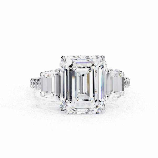 5.25 Carat Emerald and Baguette Timeless Solitaire Ring in Three Stone Setting