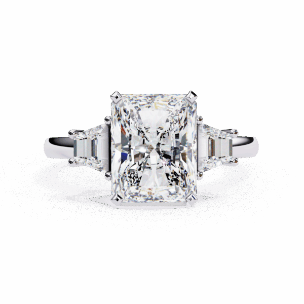 5.25 Carat Emerald and Baguette Timeless Solitaire Ring in Three Stone Setting